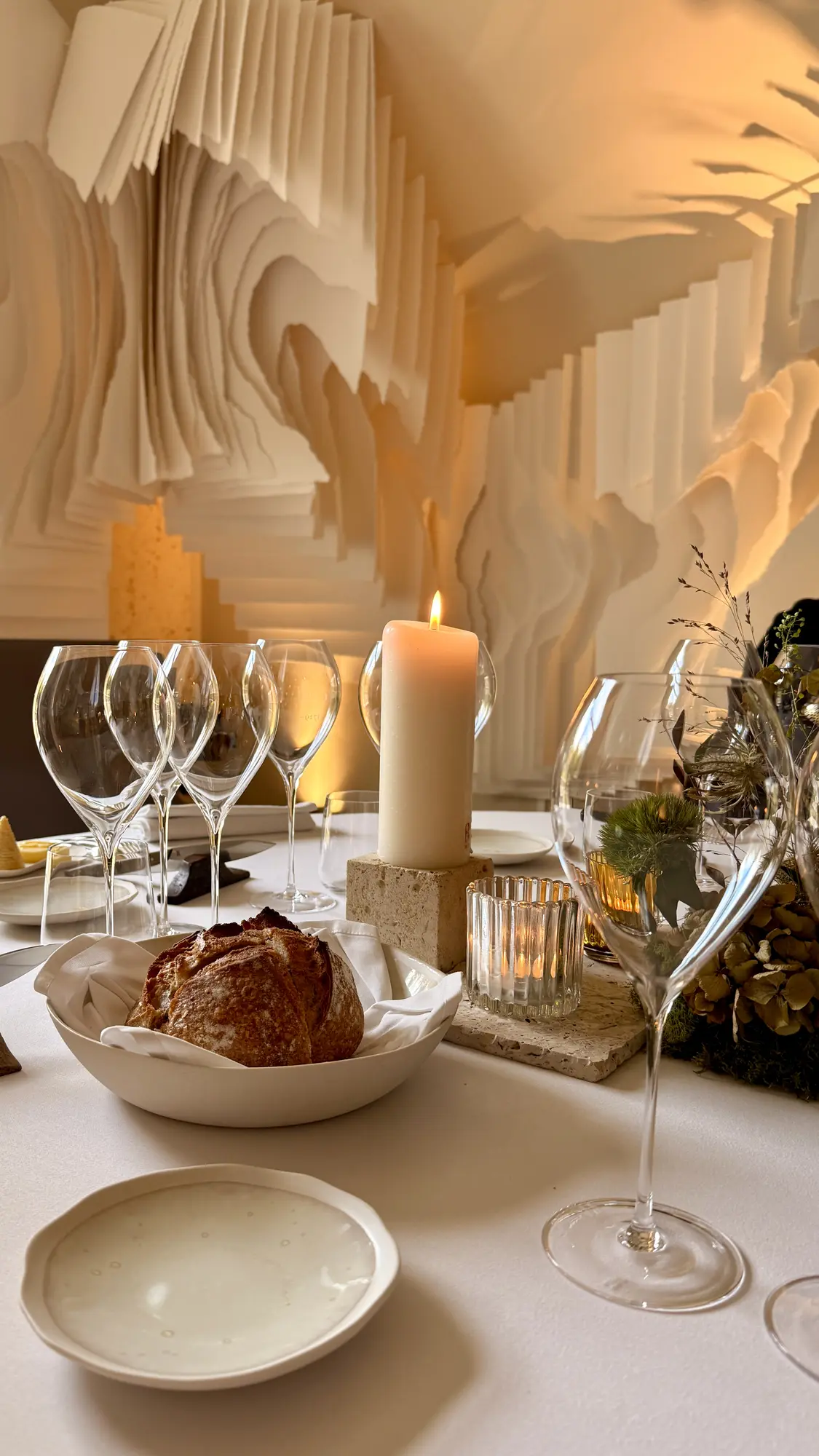 The bright, layered interior of Ruinart’s private dining room