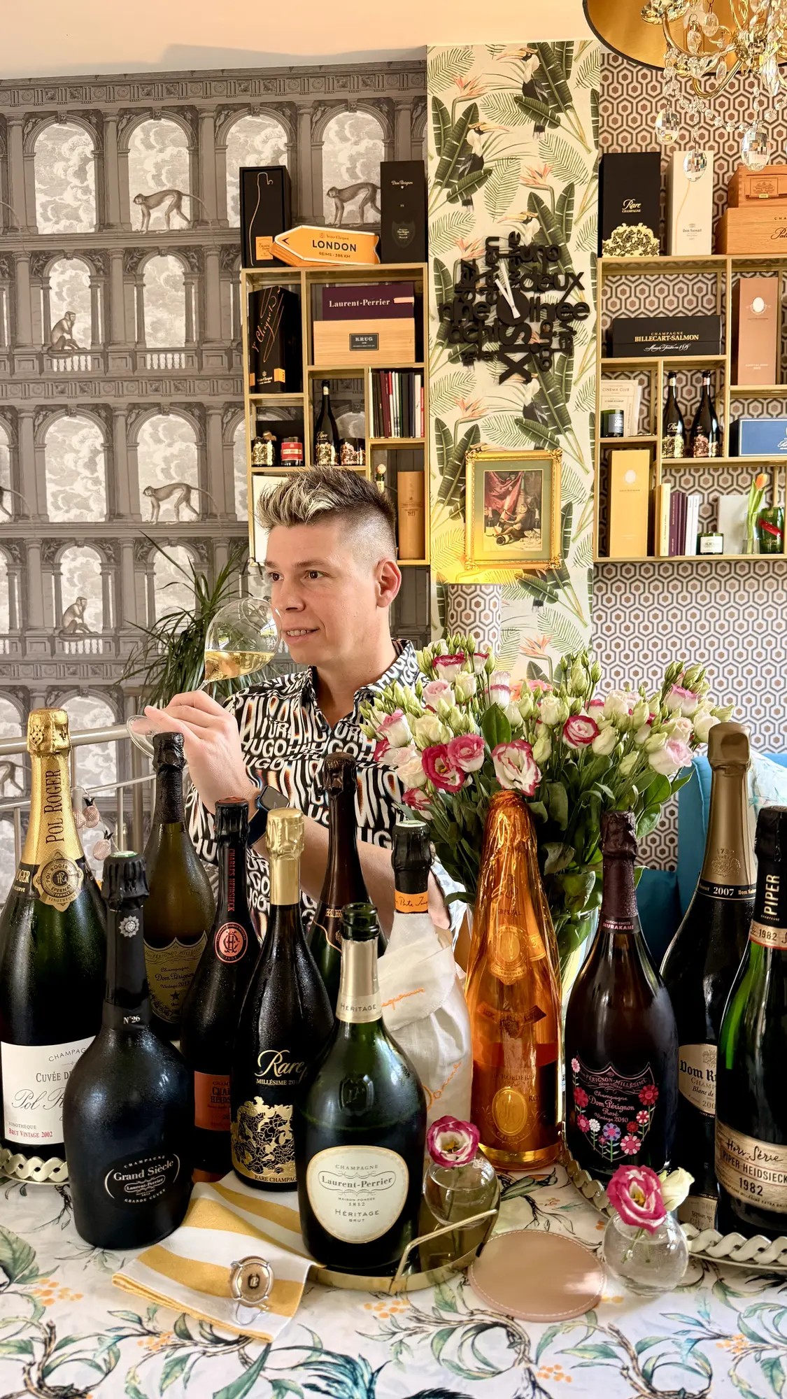 Mate Hajdu behind an extensive selection of champagnes