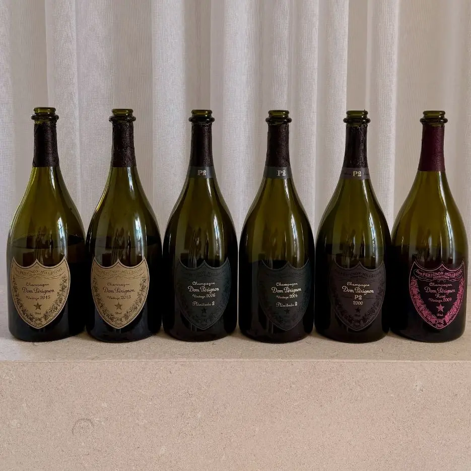 Bottles of Dom Pérignon 2015, 2013, P2 2006, 2004, 2000 and Rosé 2009