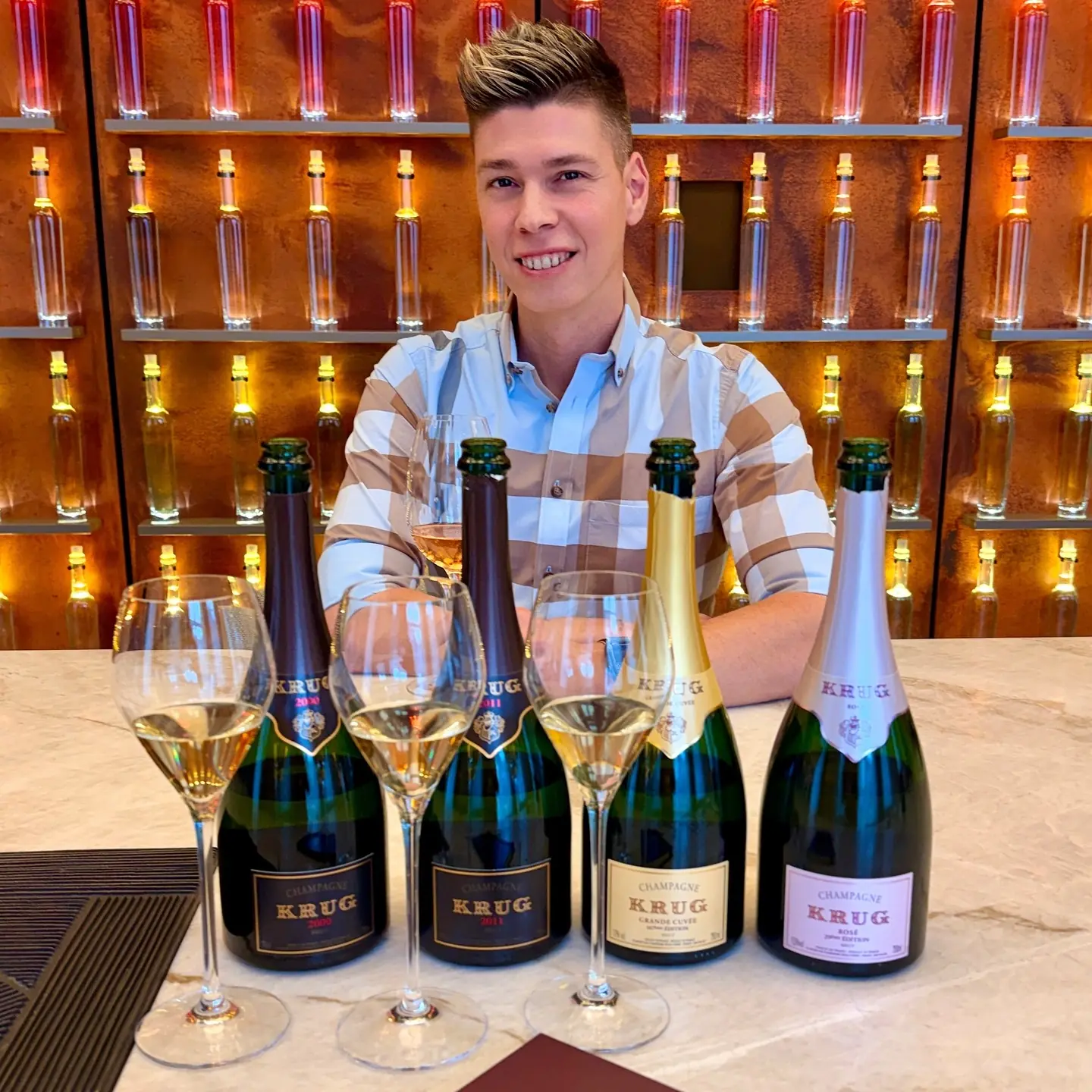 Mate Hajdu with five Krug champagnes