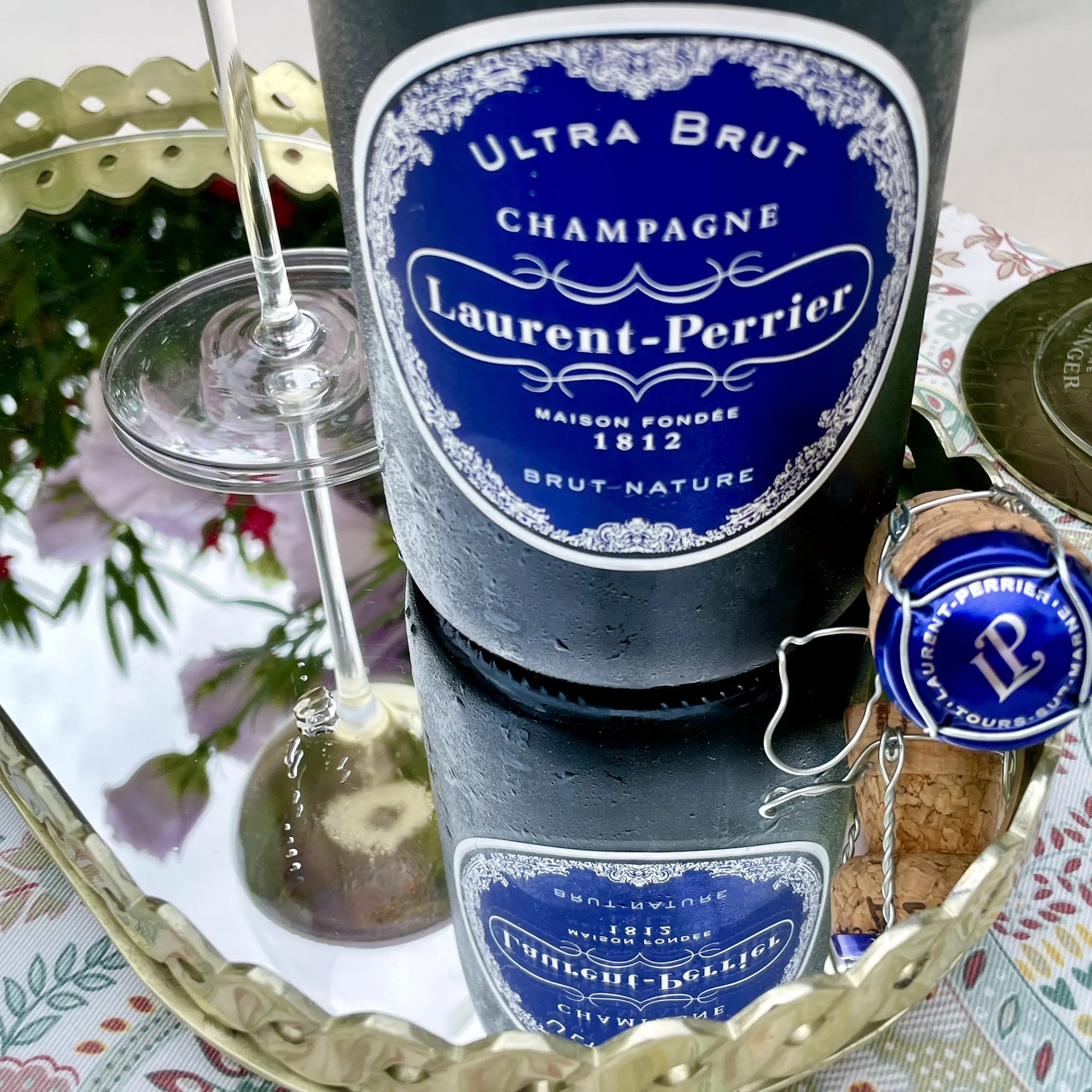 The label and neck of a Laurent-Perrier Ultra Brut bottle