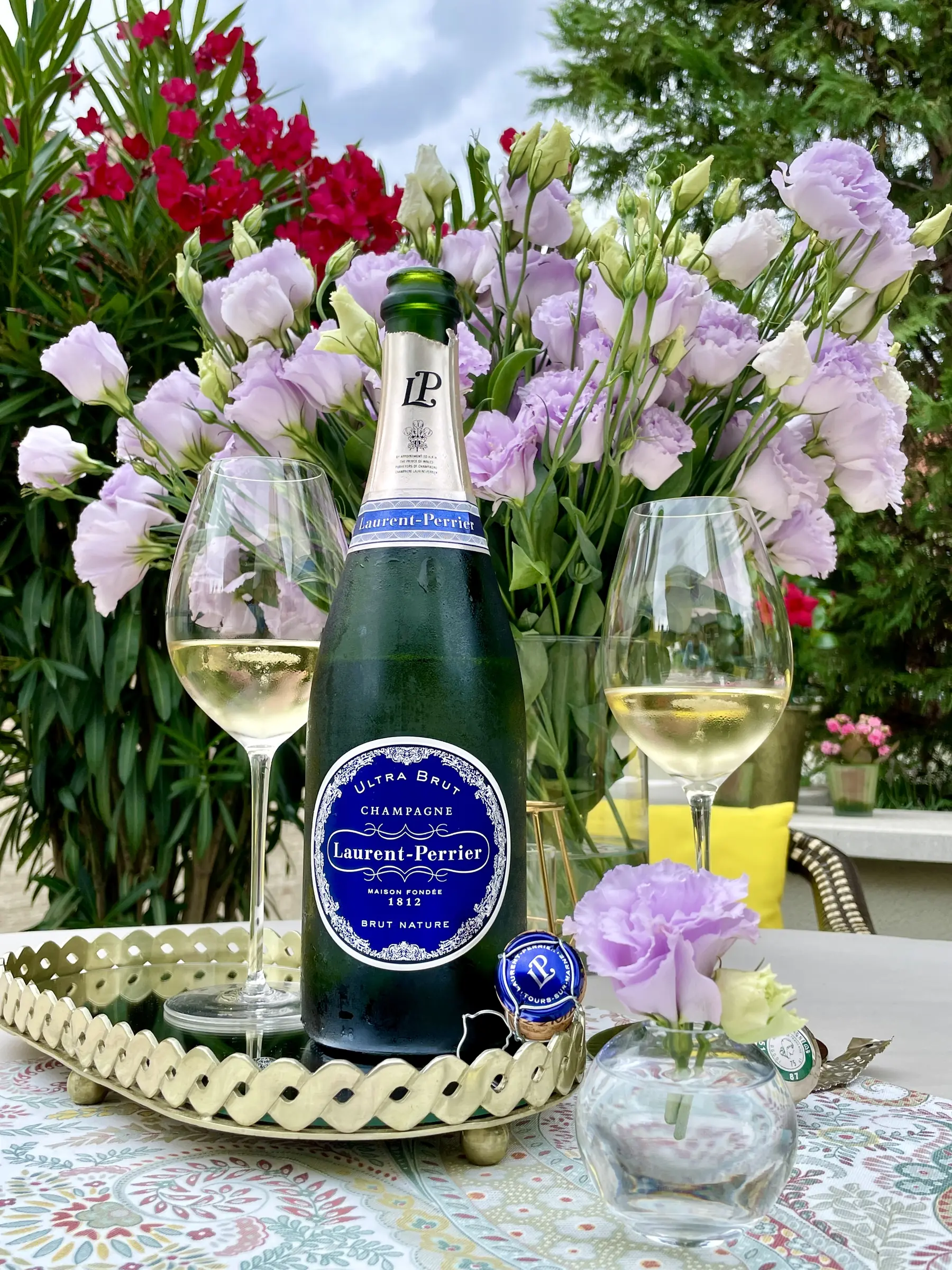 Laurent-Perrier Ultra Brut Champagne among flowers